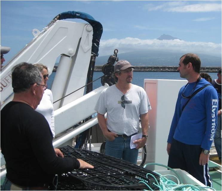 Dr. Stefannin and the captain of the University of Azores research vessel explain the sampling they do to Sorcerer II captain Charlie Howard.