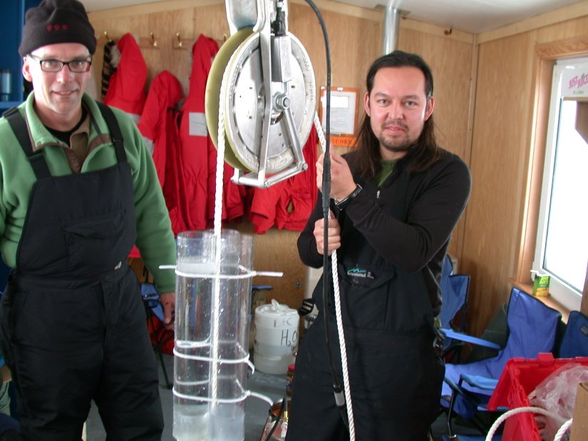 Mak and Jeff lower the sediment trap (Photo DM)