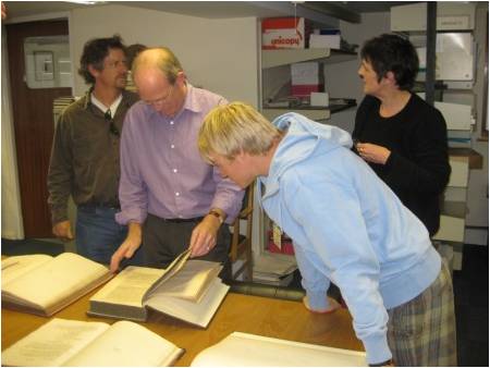 Captain Charlie Howard, Dr. Richard Pipe, Librarian Linda Noble and Jeremy Niles at the National Marine Biological Library.