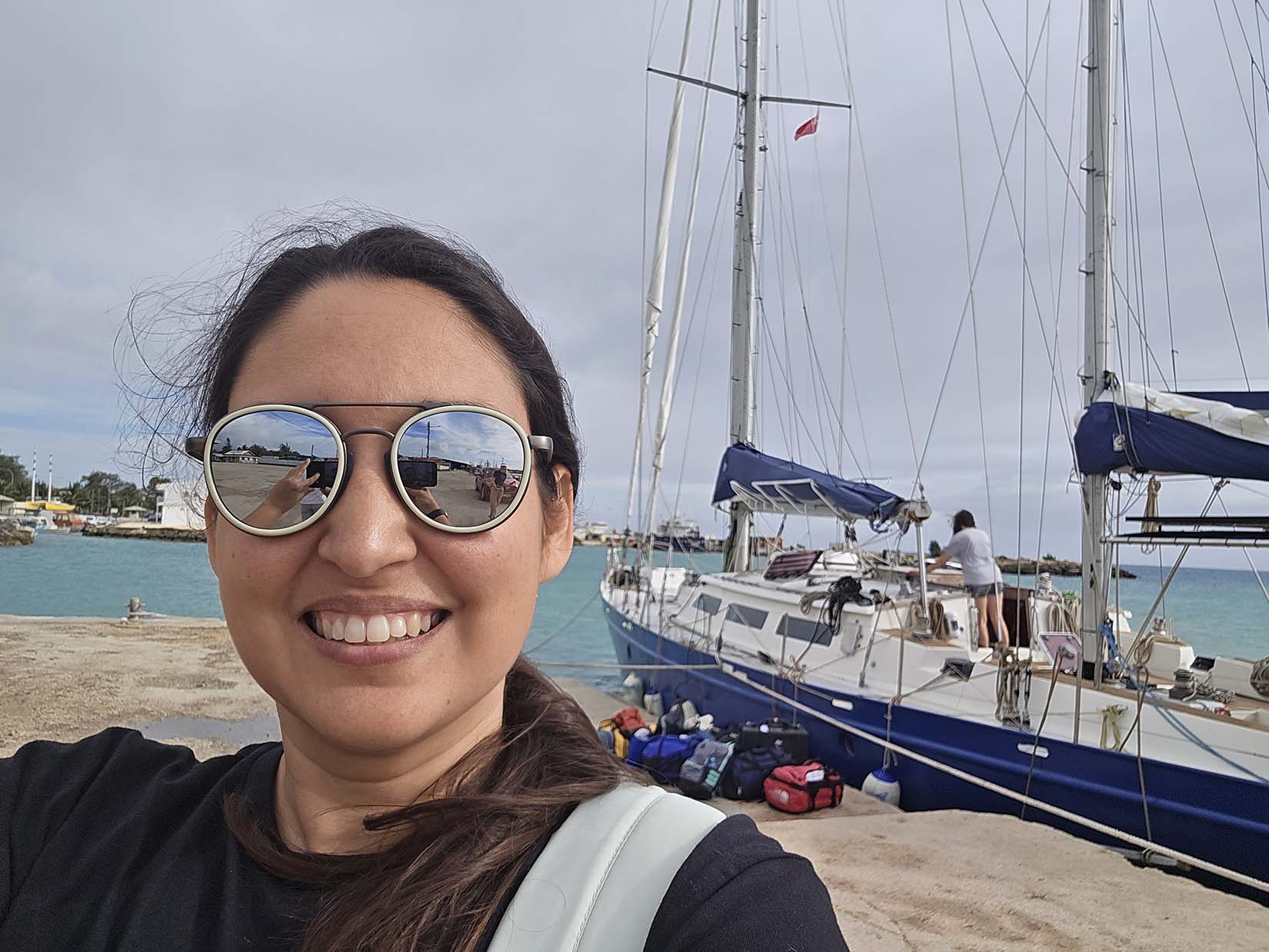 Dr. Garza in from of the research vessel Wind Shift